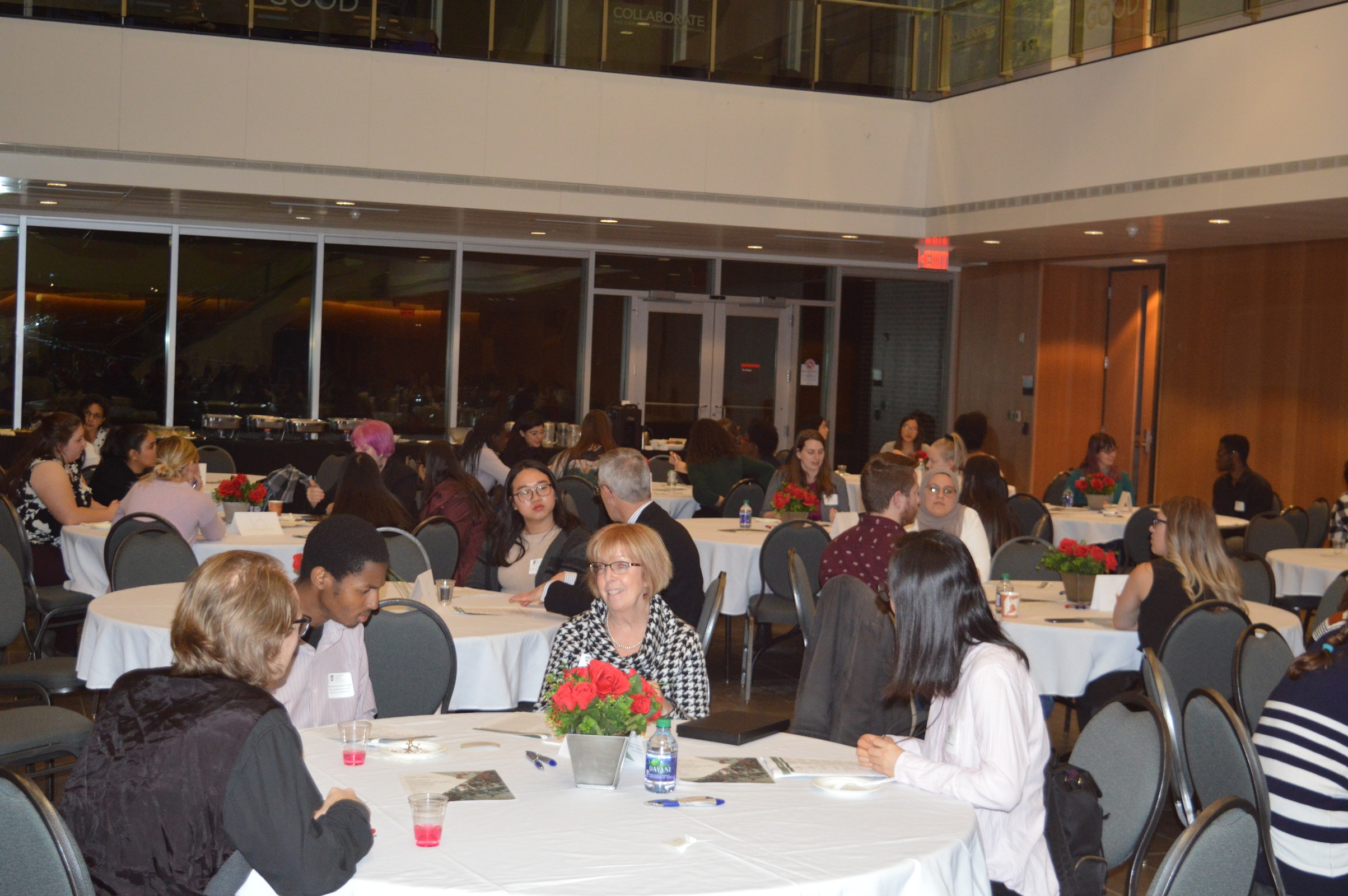 people networking at the various tables